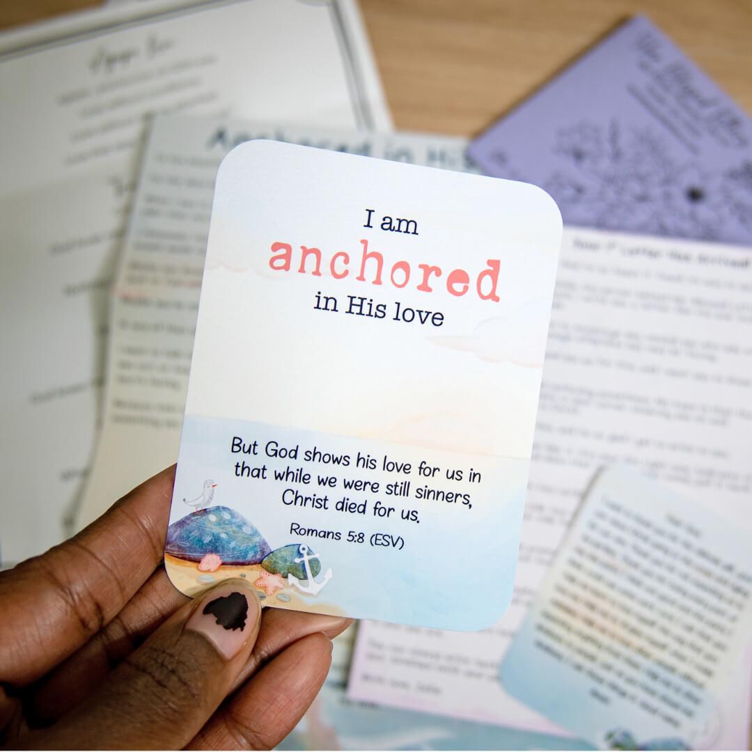 An affirmation card that says I am anchored in His love