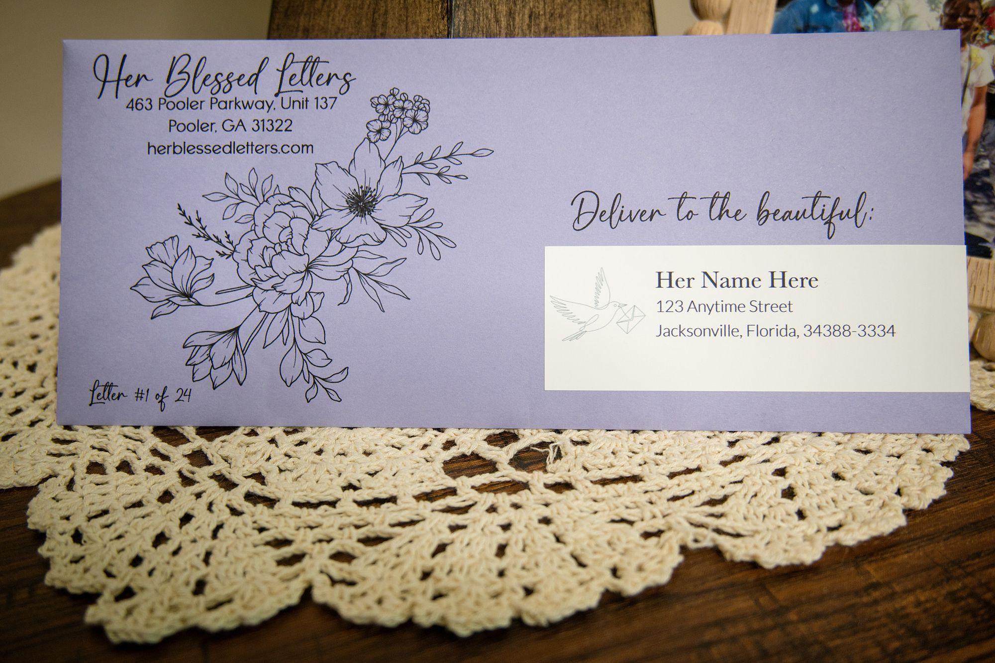 A personalized Her Blessed Letters envelope addressed to a girl