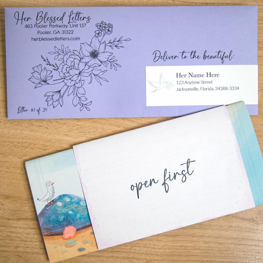 An open first letter package from Her Blessed Letters